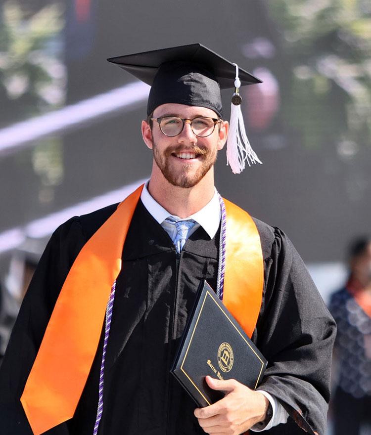 Image of student at graduation